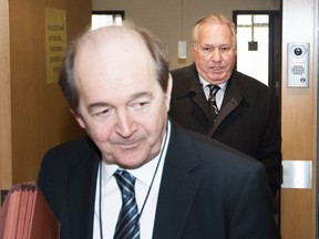 Former chief fundraiser for Union Montreal Bernard Trépanier, rear, with his lawyer Daniel Rock in March 2013.