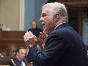 Quebec Premier Philippe Couillard responds to opposition questions Nov. 26, 2015, at the legislature in Quebec City.