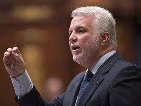 Quebec Premier Philippe Couillard responds to the Oppositions during question period, at the legislature in Quebec City on Tuesday, Feb. 9, 2016.