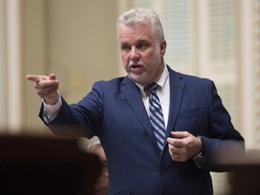 Quebec Premier Philippe Couillard responds to the Opposition over Anticosti, during question period Thursday, February 11, 2016 at the legislature in Quebec City.