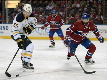 Canadiens coach Michel Therrien was baffled by a turnover from Andrei Markov, right, defending against Sabres defenceman Rasmus Ristolainen on Friday, Feb. 12, 2016, in Buffalo,  
late in the first period that led to an Evander Kane goal to put the Sabres ahead 2-1.
"Andrei knows he can't be doing that; it's a lack of concentration," Therrien said.