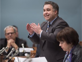 Quebec Education and Family Minister Sebastien Proulx responds to the Opposition during question period Wednesday, February 24, 2016 at the legislature in Quebec City.