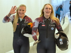 Second placed Kaillie Humphries, left,  and  Melissa Lotholz of Canada celebrate after their final run at the  women's  bob race at the Bob World Championships in Igls, near Innsbruck, Austria, on Saturday, Feb. 13, 2016.