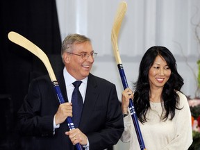 Buffalo Sabres owner Terry Pegula and his wife, Kim, pose for cameras during groundbreaking ceremonies at First Niagara Centre in Buffalo, N.Y., in 2013.