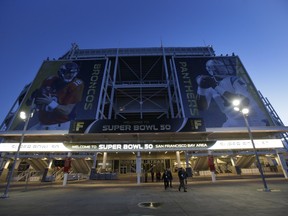 The entrance to Levi's Stadium is decorated with images of Denver Broncos quarterback Peyton Manning, left, and Carolina Panthers quarterback Cam Newton Tuesday, Feb. 2, 2016 in Santa Clara, Calif. The Denver Broncos will play the Carolina Panthers in the NFL Super Bowl 50 football game Sunday, Feb. 7, 2015, at Levi's Stadium.