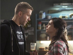 Ryan Reyonlds, left, and Morena Baccarin in a scene from the film, Deadpool.