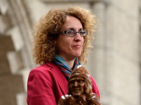 The Gerhard Herzberg Canada Gold Medal for Science and Engineering prize winner Victoria Kaspi stands as she is recognized by the House of Commons following question period on Parliament Hill in Ottawa on Tuesday, Feb. 16, 2016.