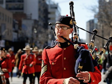 Members of the RCMP Pipe and Drums Band take part in the annual St. Patrick's Parade in Montreal on Sunday, March 20, 2016.
