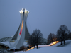 The Montreal Olympic Stadium lit in the colors of the Belgian flag, Wednesday March 23, 2016, in solidarity with the victims of Tuesday’s  terror attacks in Brussels.