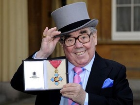 FILE - This is a Feb. 16, 2012 file photo of of British comedian Ronnie Corbett after he received his Commander of the British Empire (CBE), at Buckingham Palace in London. British comedian Ronnie Corbett, half of much-loved duo The Two Ronnies, has died at the age of 85. Corbett’s publicist says he passed away Thursday March 31, 2016 surrounded by his family. The cause of death was not disclosed. Edinburgh-born Corbett came to prominence on the satirical 1960s TV show &ampquot;The Frost Report.&ampquot; In 197