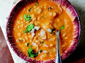 Fava beans are mixed into a blend of tomato, garlic and onion in this soup from the editors of Saveur magazine.