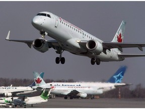 An Air Canada jet takes off from Halifax Stanfield International Airport in Enfield, N.S. on Thursday, March 8, 2012. The Canadian Human Rights Tribunal is investigating whether the country's largest airline discriminated against an Arab-Canadian man through overzealous use of U.S. aviation security lists.