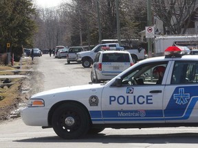 Police block a section of Roxboro near the Sunnybrooke train station after reports of a man with an explosive device March 29, 2016.