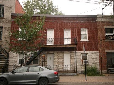 Before: The facade of this Plateau home before the renovations. It was a quadriplex that had been converted into a duplex decades ago. Photo courtesy Point Carré