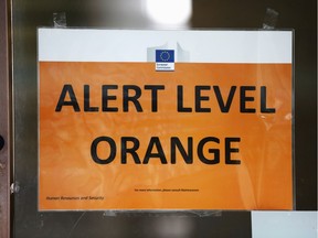 Alert Level Orange sign is seen on an EU Commission building following todays attack on March 22, 2016 in Brussels, Belgium.