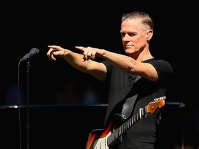 Bryan Adams performs during the 2015 AFL Grand Final match between the Hawthorn Hawks and the West Coast Eagles at Melbourne Cricket Ground on Oct. 3, 2015 in Melbourne, Australia.  (Quinn Rooney/Getty Images)