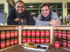 Business partners Stanley Dumornay, left, and Jason Delis, with their version of mamba: it's made from dry-roasted Haitian peanuts, organic cane sugar, salt and hot chili pepper.