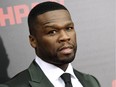 Rapper 50 Cent got some spare change for his 52-room mansion.