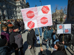 An anti-austerity demonstration in Place Jacques Cartier on Sunday called for Premier Philippe Couillard to resign.