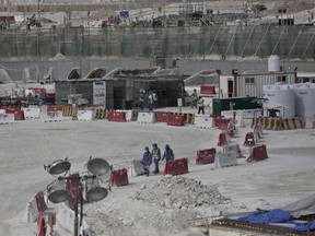 Migrant laborers faced abuse that in some cases amounted to forced labor while working on a stadium that will host soccer matches for the 2022 World Cup in Qatar, a new report released by Amnesty International alleged Thursday, March 31, 2016.
