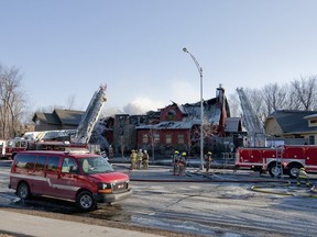 Firefighters battle a blaze at Spa Finlandais in Rosemère in 2013.