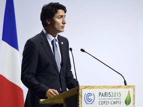 Canadian Prime Minister Justin Trudeau  delivers a speech delivers a speech during the opening day of the World Climate Change Conference 2015 (COP21), on November 30, 2015 at Le Bourget, on the outskirts of the French capital Paris. World leaders opened an historic summit in the French capital with "the hope of all of humanity" laid on their shoulders as they sought a deal to tame calamitous climate change.