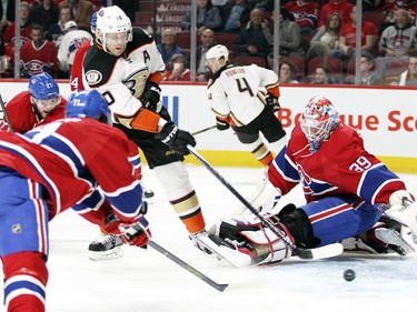 Anaheim Ducks' Corey Perry shoots the puck past goalie Mike Condon for a goal during second- period action in Montreal Tuesday, March 22, 2016.