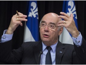 Quebec Transport Minister Jacques Daoust speaks at a news conference on March 24, 2016 at the legislature in Quebec City.