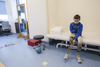 Mykola Nyzhnykovskyi, 11, waits for the start of a session where he walked on his prosthetic legs with a physiotherapist at Shriners Hospitals for Children in Montreal Tuesday, March 15, 2016. Mykola lost his legs and an arm in East Ukraine and sustained other serious injuries from an exploding grenade that killed his younger brother.