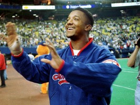 Former Montreal Expos pitcher Pedro Martinez waves goodbye to fans Sept. 28, 1997.