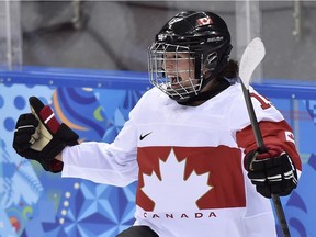 Melodie Daoust, celebrating a Team Canada goal at the 2014 Sochi Olympics, and her McGill Martlets face B.C. in their opening game Thursday at the CIS Women's Hockey Championship in Calgary.
