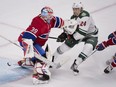 Minnesota Wild's Matt Dumba  moves in on Montreal Canadiens' goalie Mike Condon during second period NHL hockey action in Montreal on Saturday, March 12, 2016.