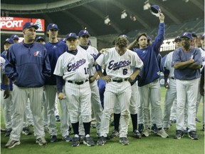 Members of the Expos  gather to say goodbye to fans after their final home game at Olympic Stadium on Sept. 29, 2004.