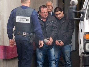 Raynald Desjardins and Felice Racaniello exiting the Joliette courthouse,  north of Montreal  on Wednesday December 21, 2011.