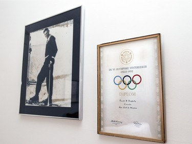 A large photograph of her father Donald and his certificate as Canada's assistant chef de mission at the 1952 Olympics in Oslo are displayed on a wall in the guest bedroom in Sarah Dougherty's N.D.G. flat. (John Mahoney / MONTREAL GAZETTE)