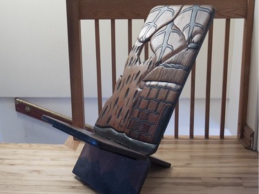 Folding wooden chair from Africa, in the apartment of Marie-Aline Vadius. (Pierre Obendrauf / MONTREAL GAZETTE)