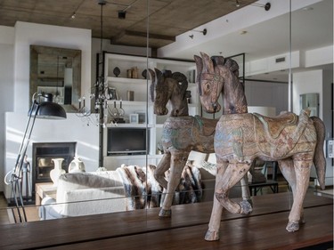 A wooden horse which comes from an old carousel inside the living room at the loft-style home of Rose Marie Randez in Outremont in Montreal. (Dario Ayala / Montreal Gazette)