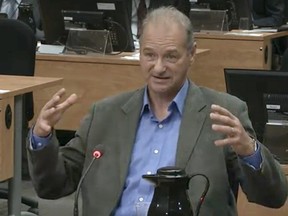 Ernest Murray, a former political attaché to Pauline Marois, testifies at the Charbonneau Commission Monday June 9, 2014 in Montreal.