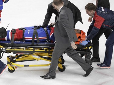 P.K. Subban of the  Montreal Canadiens is taken off the ice on a stretcher after sustaining an injury against the Buffalo Sabres in the third period of an NHL game at the Bell Centre in Montreal Thursday, March 10, 2016.