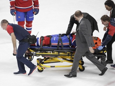 P.K. Subban of the  Montreal Canadiens is taken off the ice on a stretcher after sustaining an injury against the Buffalo Sabres in the third period of an NHL game at the Bell Centre in Montreal Thursday, March 10, 2016.