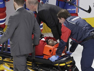 P.K. Subban of the Montreal Canadiens is taken off the ice on a stretcher after sustaining an injury against the Buffalo Sabres in the third period of an NHL game at the Bell Centre in Montreal on March 10, 2016.