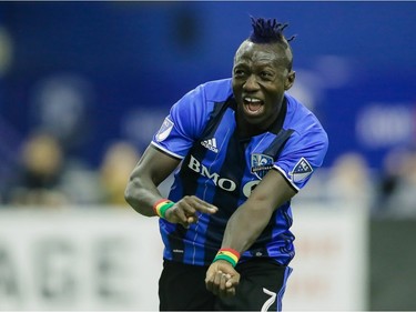 Montreal Impact forward Dominic Oduro celebrates after scoring against the New York Red Bulls during the second half of the Impact's home opening match at the Olympic Stadium in Montreal on Saturday, March 12, 2016.