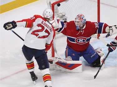 MONTREAL, QUE.: MARCH  15, 2016 -- Florida Panthers' Nick Bjugstad watches puck go past Montreal Canadiens goalie Mike Condon, during second period NHL action in Montreal on Tuesday March 15, 2016. (Pierre Obendrauf / MONTREAL GAZETTE)