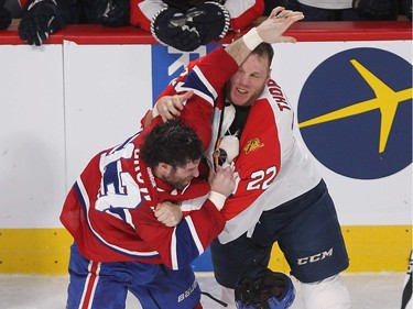 MONTREAL, QUE.: MARCH  15, 2016 -- Montreal Canadiens  Mike Brown and Florida Panthers' Shawn Thornton duke it  out at centre ice, during first period NHL action in Montreal on Tuesday March 15, 2016. (Pierre Obendrauf / MONTREAL GAZETTE)