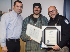 Helio Galegoand, left, and  J.P. Brabant, right, with Richard Chartier-Carle, a 27-year-old construction worker who is being hailed as a hero for saving another man’s life in November.