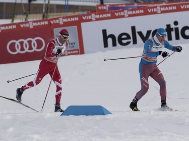 Alex Harvey of Canada, left, climbs a grade during the FIS World Cup race in  Montreal on Wednesday March 2, 2016.