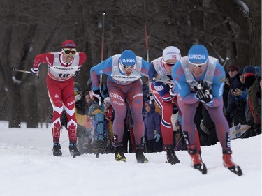 Alex Harvey of Canada, left, competes in the FIS World Cup race in Montreal on Wednesday March 2, 2016.