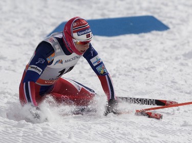 Astrid Uhrenholdt Jaconsen of Norway falls to the snow after crossing the finish line in third place during the FIS World Cup race in Montreal on Wednesday March 2, 2016.