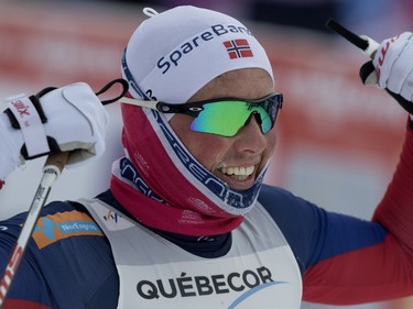 Emil Iverson of Norway celebrates after crossing the finish line to win the FIS World Cup race in  Montreal on Wednesday March 2, 2016.