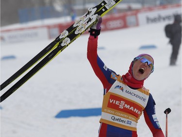 Therese Johaug of Norway lets out a scream as she crosses the finish line to win the FIS World Cup race in Montreal on Wednesday March 2, 2016.